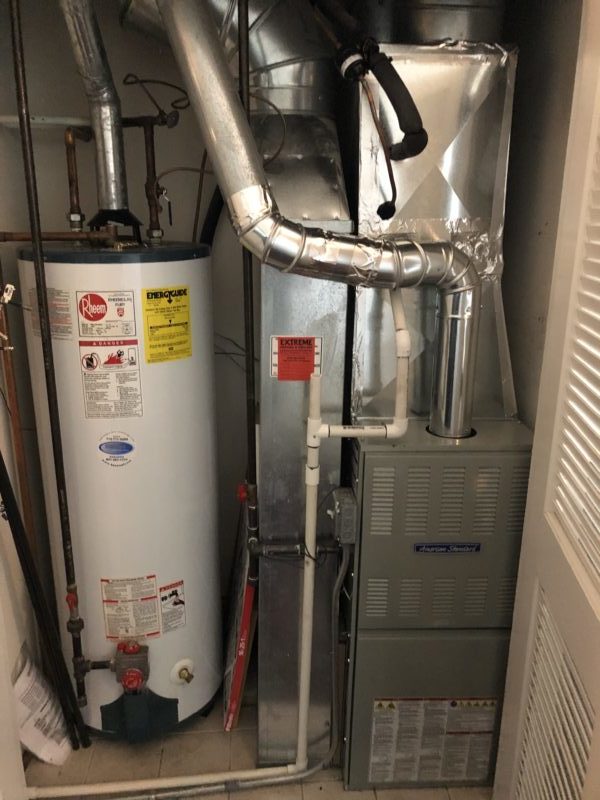 Installing Rheem Water Tank & American Standard Furnace Replacement in Chicago